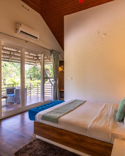 Nysa-Estate-5-bhk-luxury-villa-in-coorg-with-private-pool-and-spacious-rooms-bedroom-balcony-view