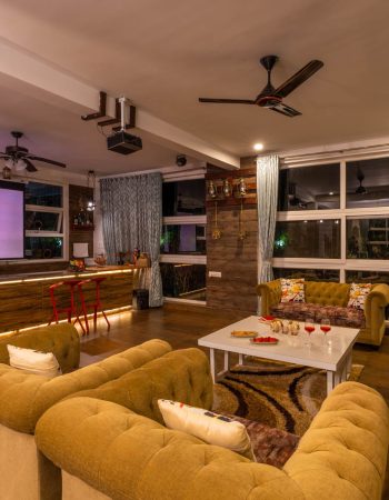 Nysa-Estate-5-bhk-luxury-villa-in-coorg-with-private-pool-and-spacious-rooms-livingroom-projector-view