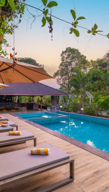 Nysa-Estate-5-bhk-luxury-villa-in-coorg-with-private-pool-and-spacious-rooms-pool-sunbed-creepers